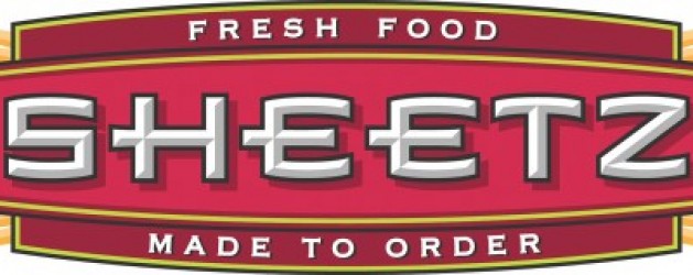 The image shows a Sheetz logo with a red and yellow background. The text reads "FRESH FOOD" at the top and "MADE TO ORDER" at the bottom, with "SHEETZ" prominently displayed in the center in large white letters with a 3D effect.