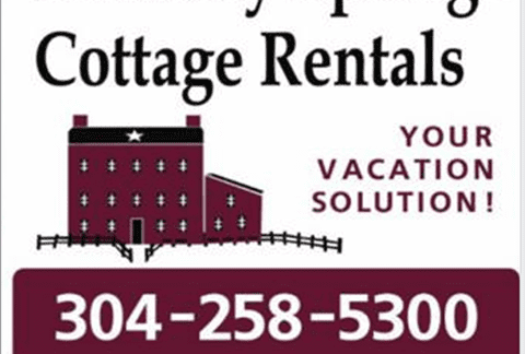 Image of an advertisement for Berkeley Springs Cottage Rentals. It includes an illustration of a red house with a star and white windows. The text says, "Berkeley Springs Cottage Rentals," "Your Vacation Solution!" and provides a phone number 304-258-5300 and a website www.BerkeleySpringsCottageRentals.com.