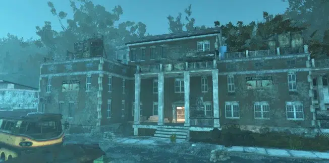 A large, dilapidated brick building with overgrown vegetation, broken windows, and faded walls. The entrance is dimly lit, and abandoned vehicles and debris are scattered in front. The scene appears post-apocalyptic.